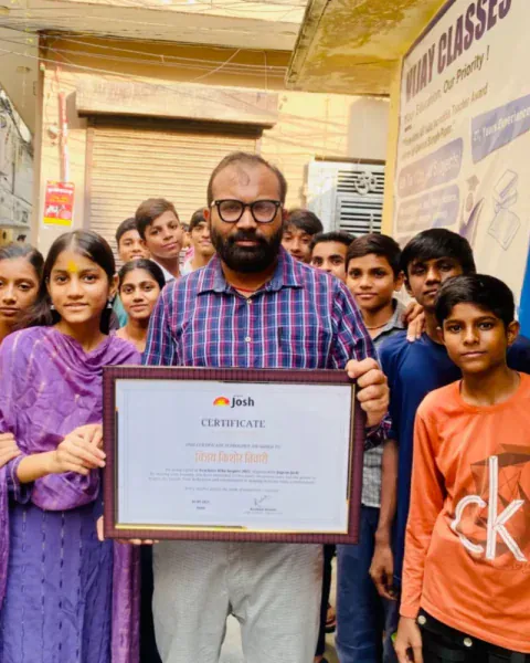 Vijay Kishor Tiwari and his students with a Certificate of Appreciation from Jagran Josh